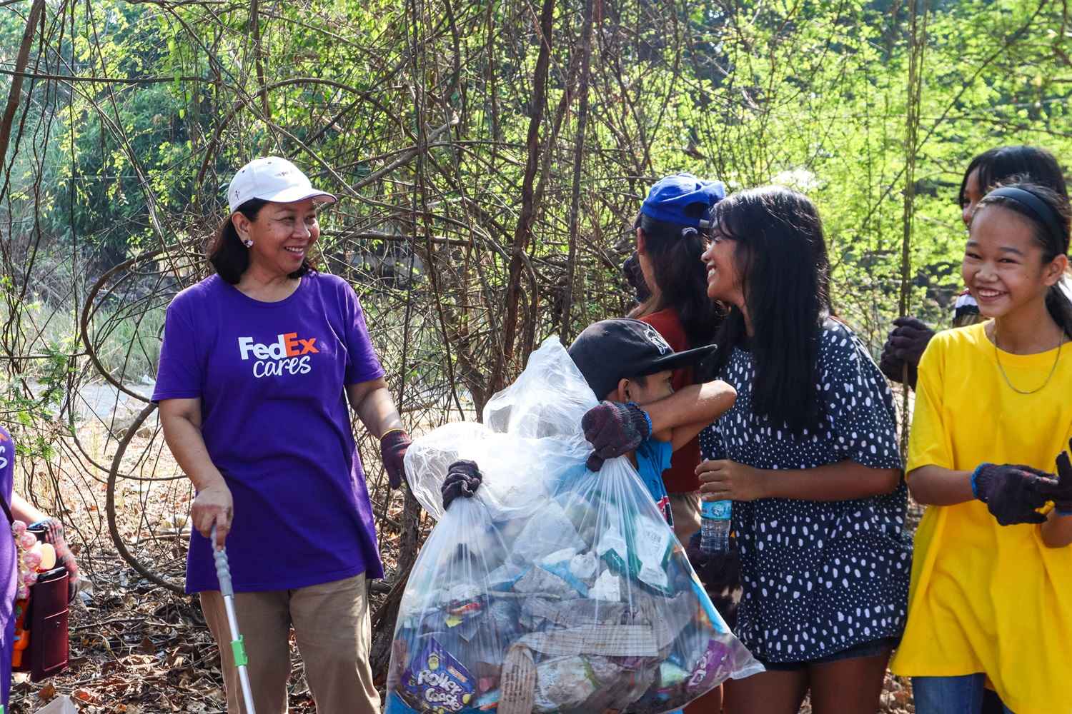 FedEx Maribeth Espinosa and the Masinloc community.