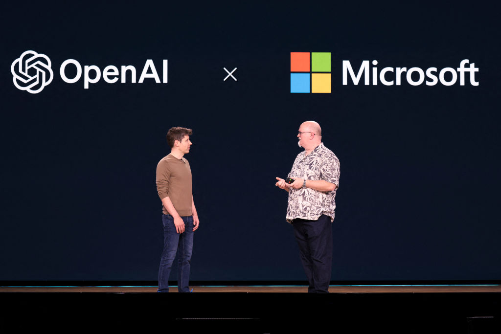 OpenAI CEO Sam Altman speaks with Microsoft Chief Technology Officer and Executive VP of Artificial Intelligence Kevin Scott during the Microsoft Build conference.